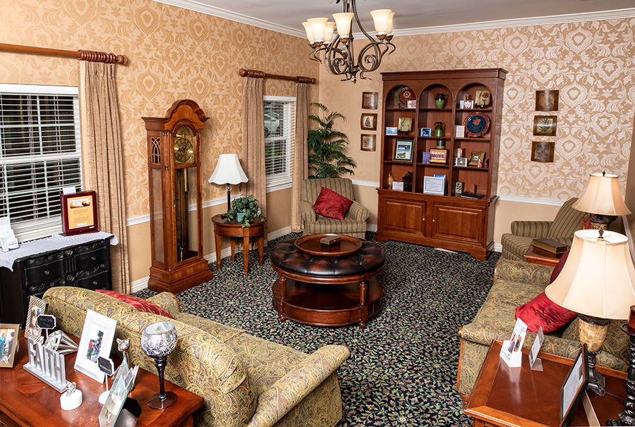 Cozy living room with elegant decor and warm lighting.