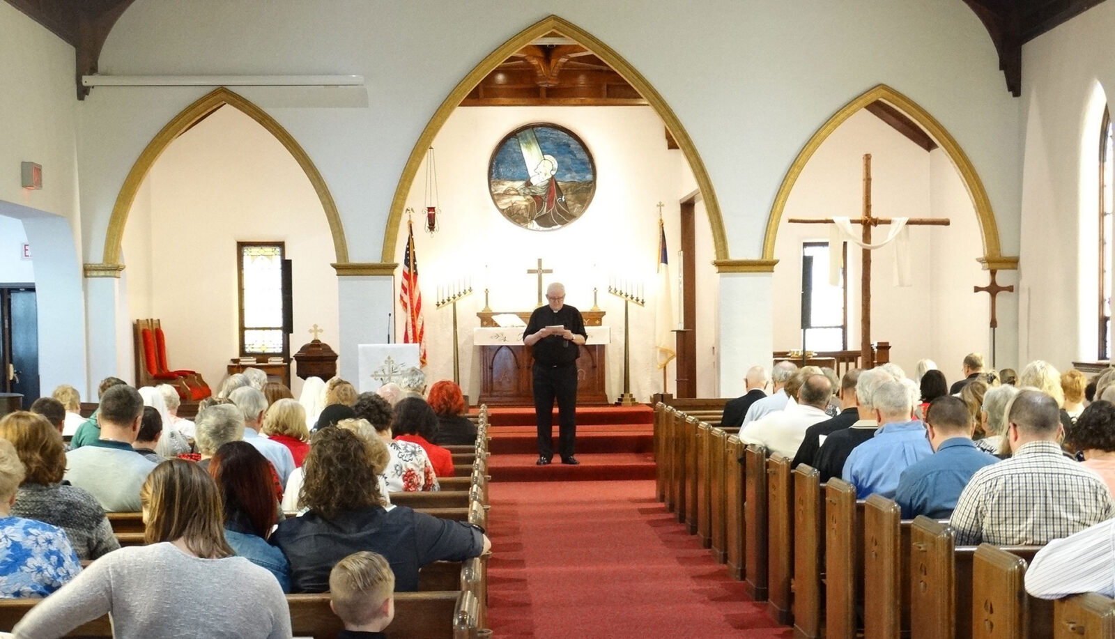Congregation gathered in a church for a service.