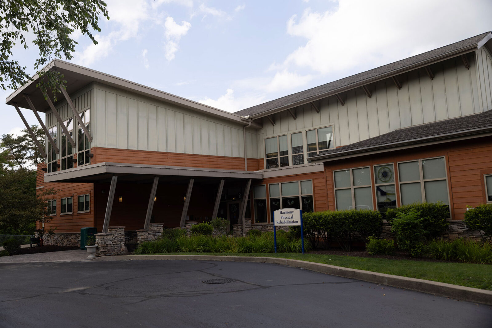 Modern building exterior with signage for physical rehabilitation.