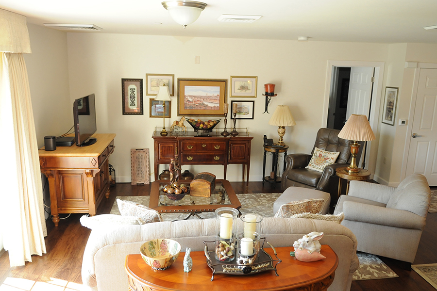 Cozy living room with elegant furniture and decorations.