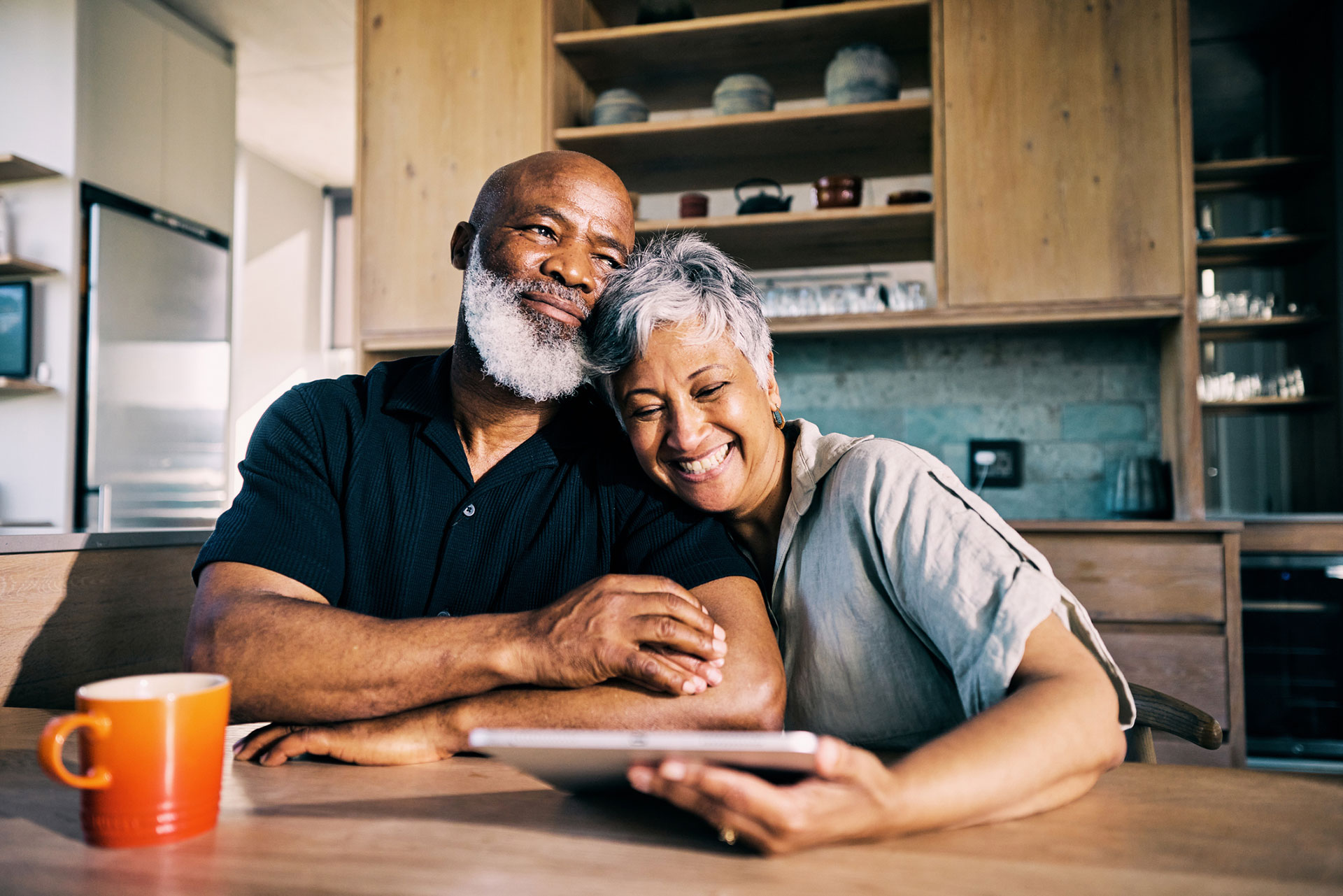 Happy couple enjoying time together at home.
