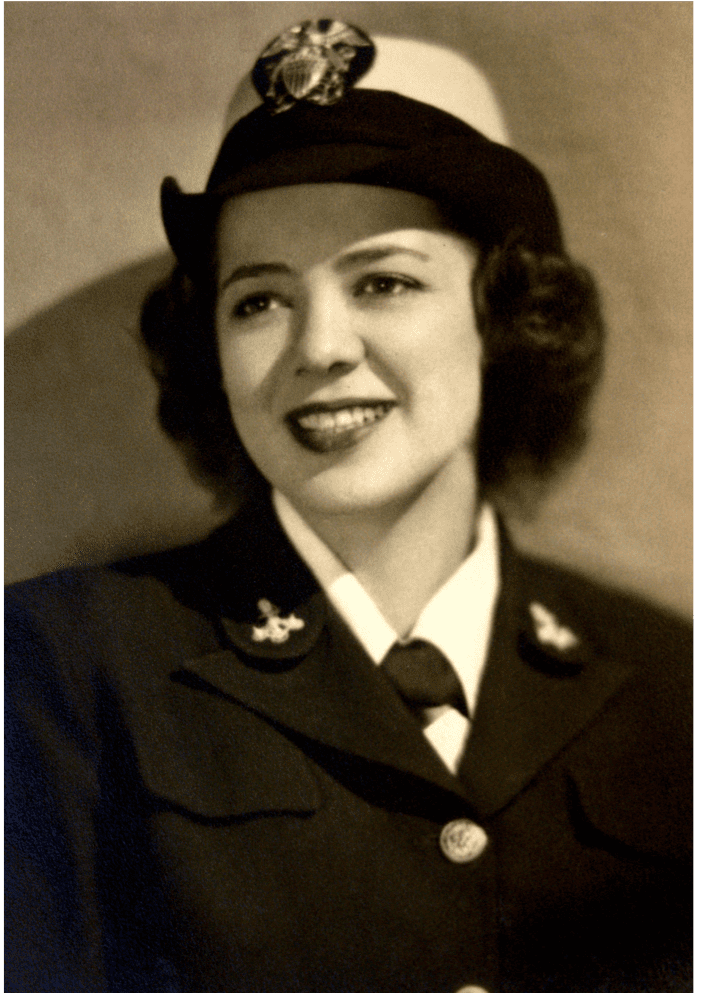 Julia poses for a black and white photo in her US Navy WAVES uniform