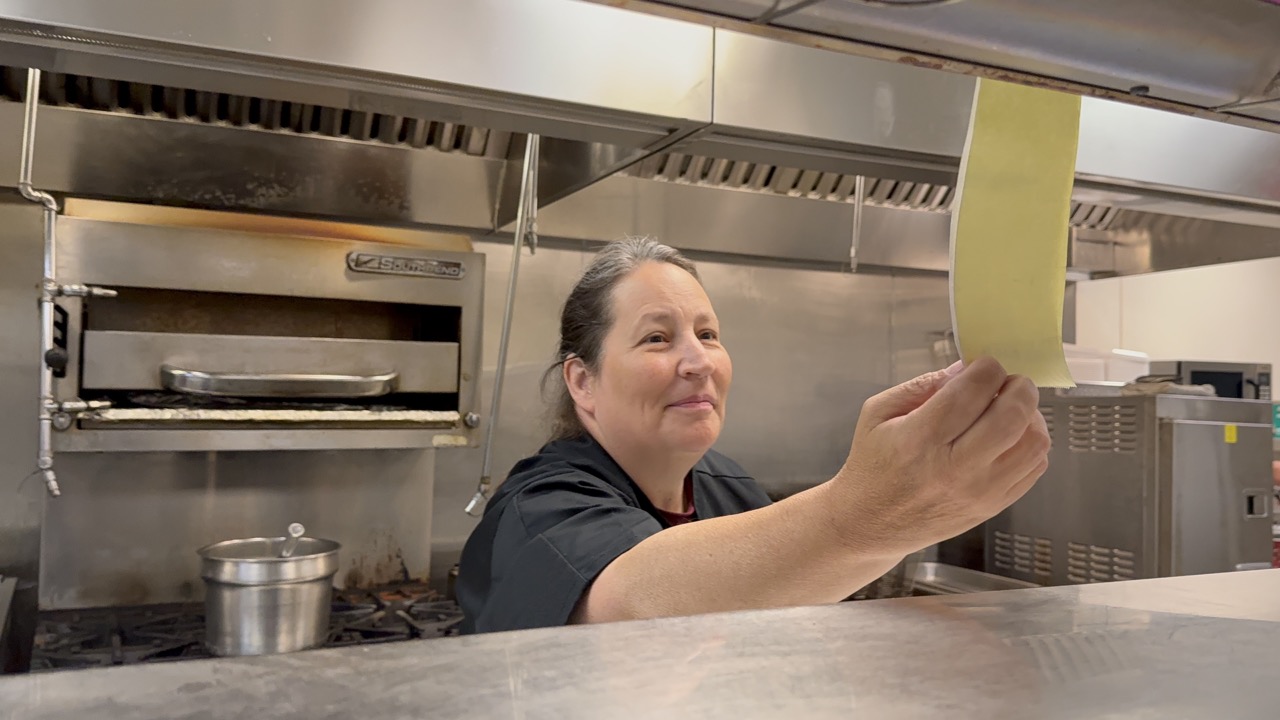 Francine, head chef for Concordia at Sumner checks an order ticket