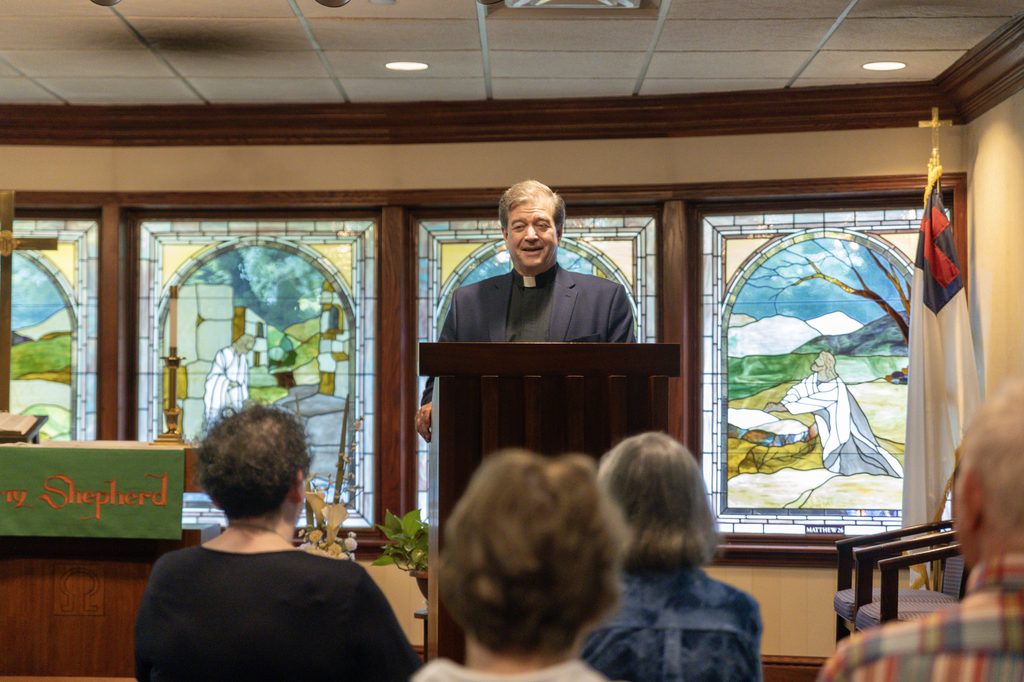 Concordia chaplain leading a worship service for residents on campus